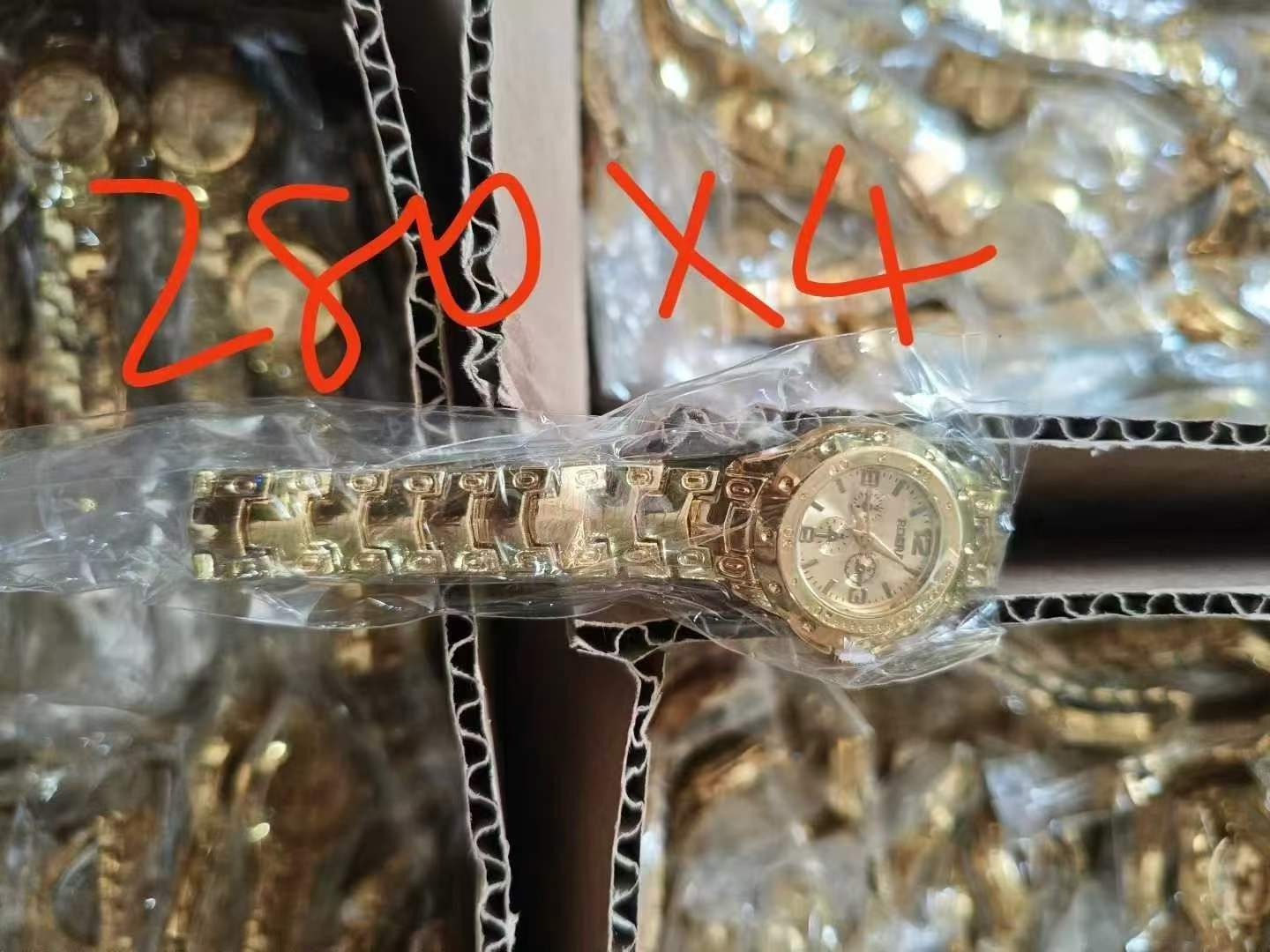 small gold watch